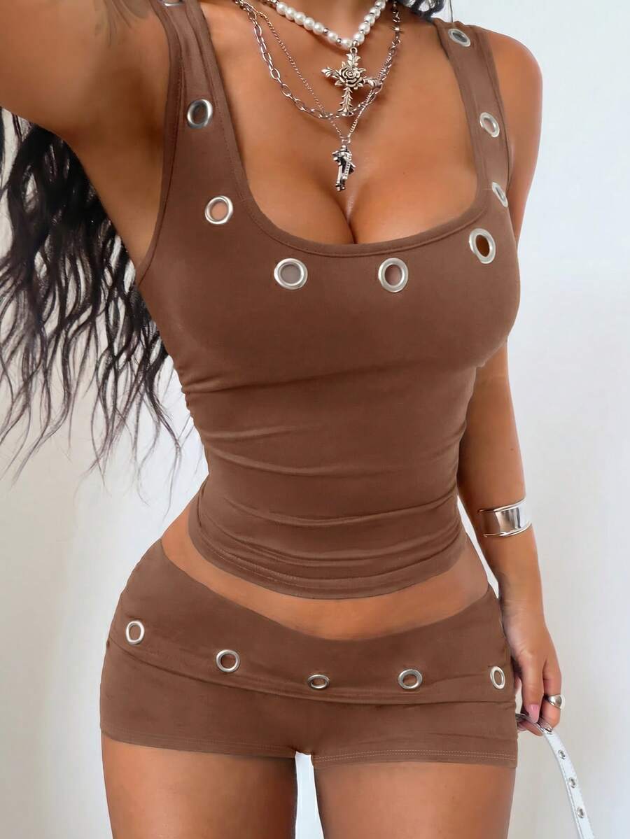 Women's slim fit two-piece set with scoop neck camisole, mini shorts, and studded detail