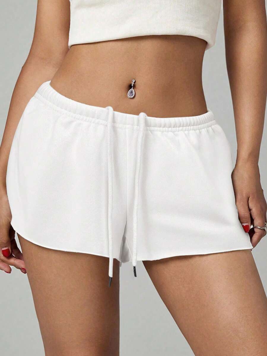 Petite women's burgundy casual track shorts with drawstring waist, raw hem, loose fit, and mini length