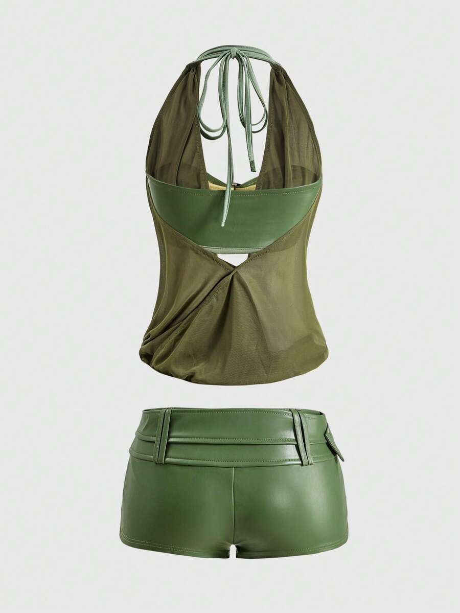 Women's Gyaru-style two-piece outfit with a draped halter crop top, backless tie detail, and mini bodycon shorts