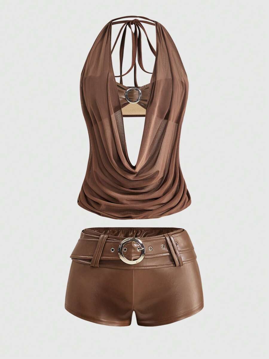 Women's Gyaru-style two-piece outfit with a draped halter crop top, backless tie detail, and mini bodycon shorts