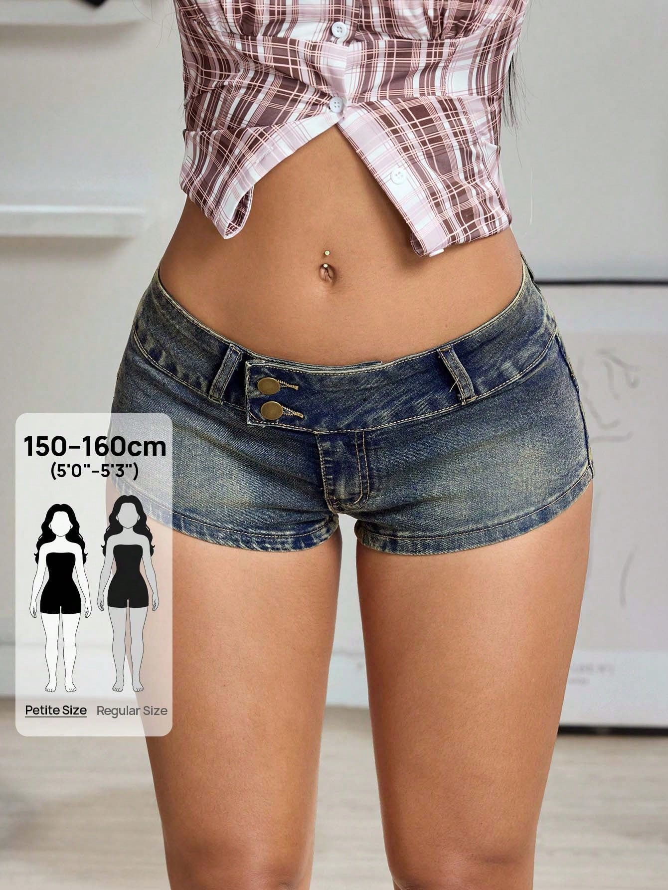 Women's petite Y2K medium wash mini shorts with ripped details, random print accents, zipper fly, mid waist, and skinny straight-leg fit.