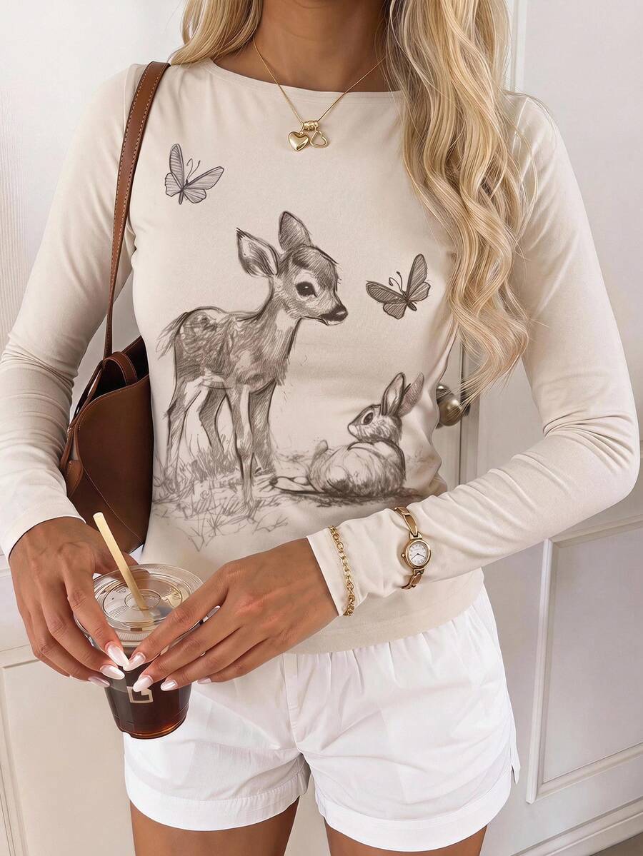 Casual CovetEZ long sleeve T-shirt with leopard-style random print, round neck, loose fit, and asymmetrical detail