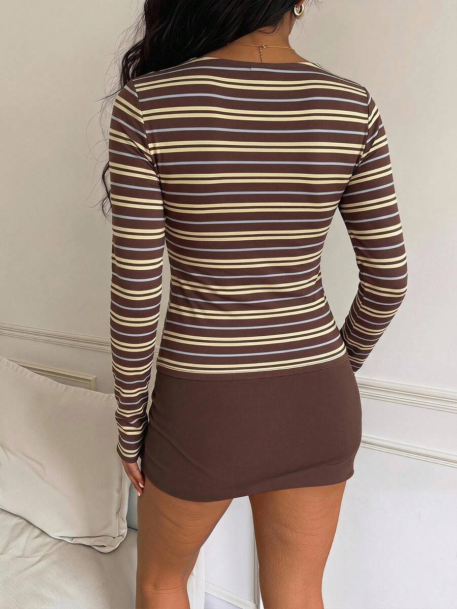 Casual CovetEZ long sleeve T-shirt with leopard-style random print, round neck, loose fit, and asymmetrical detail