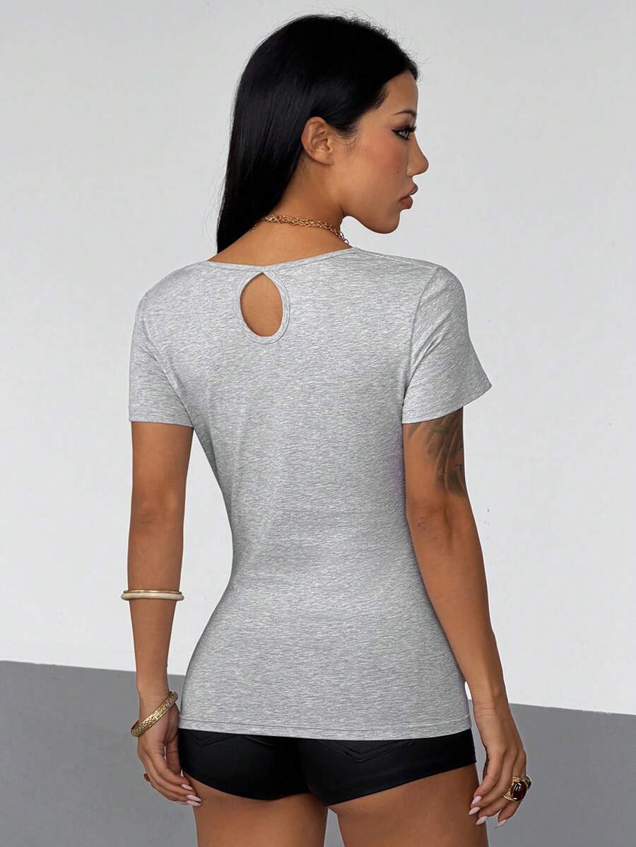 Women's slim fit short sleeve T-shirt with a low cut cowl neck, ruched details, and ruffle hem in a casual Y2K-inspired streetwear style.