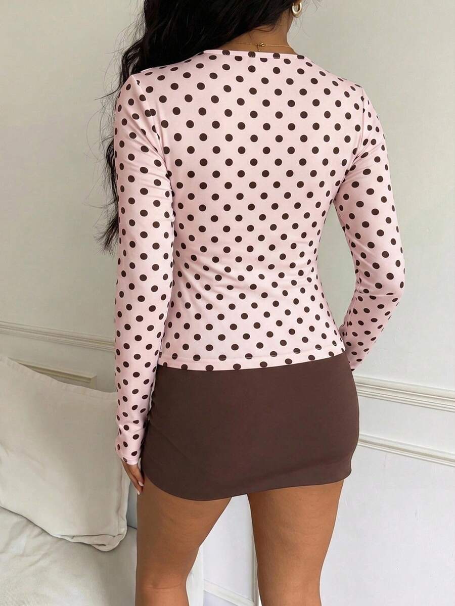 Casual CovetEZ long sleeve T-shirt with leopard-style random print, round neck, loose fit, and asymmetrical detail
