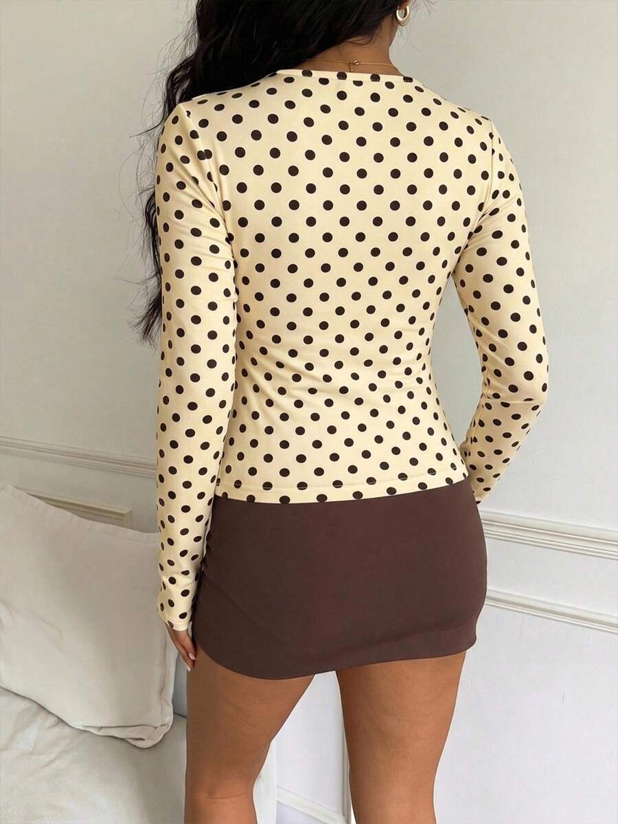 Casual CovetEZ long sleeve T-shirt with leopard-style random print, round neck, loose fit, and asymmetrical detail
