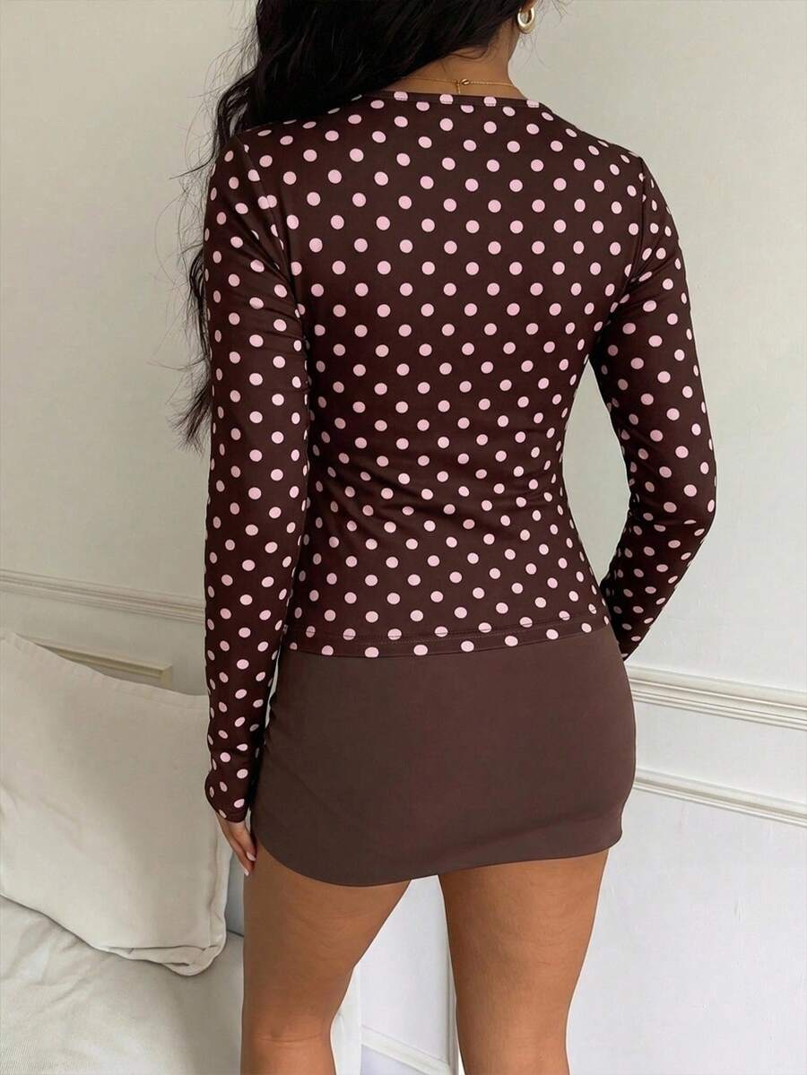 Casual CovetEZ long sleeve T-shirt with leopard-style random print, round neck, loose fit, and asymmetrical detail