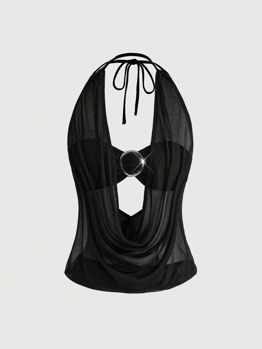 Women's two-piece outfit with a sleeveless halter cowl neck backless crop camisole, tie-back detail, bandeau inner, and leopard print shorts.
