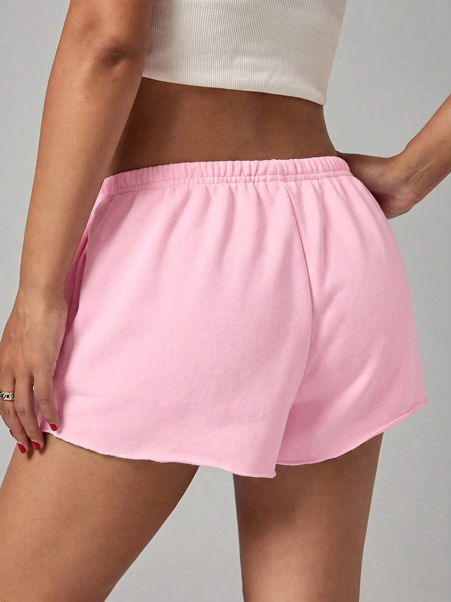Petite women's burgundy casual track shorts with drawstring waist, raw hem, loose fit, and mini length